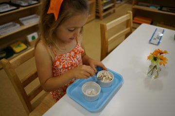 child having food at our montessori school