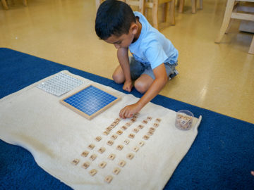 kid playing number games while learning